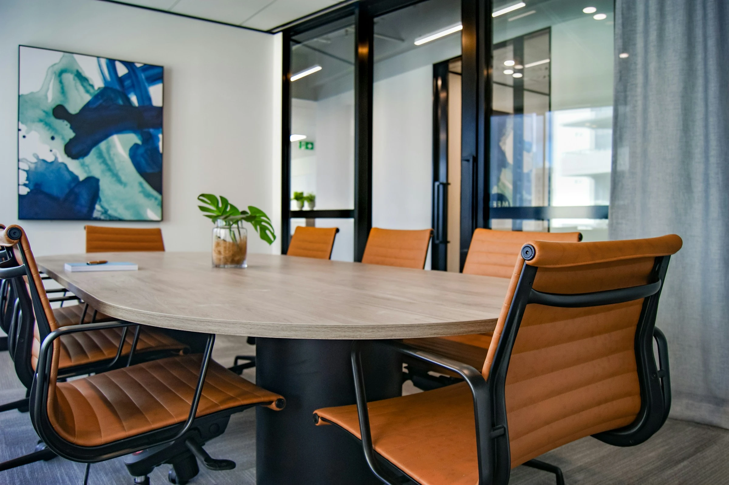 Corporate board room prepared for shareholder disputes and operating agreement review.